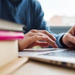 Man-is-studying-using-laptop